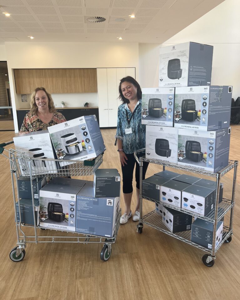 Participants at YWCA Canberra air fryer cooking skills session